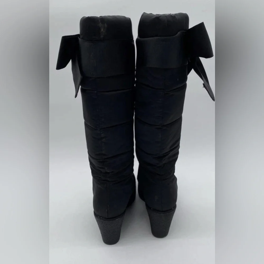 Kate Spade New York woman's Cagney black Quilted Wedge Heel snow boots